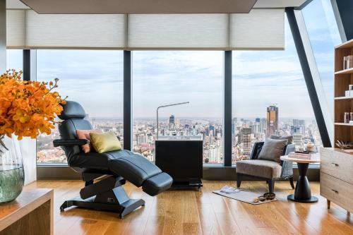 an office with a view of a city at Rosewood Phnom Penh in Phnom Penh