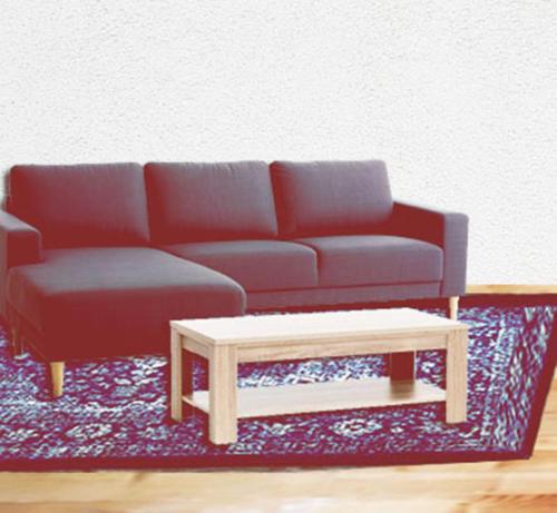 a living room with a couch and a coffee table at Jahorinska Planinska Vila in Jahorina