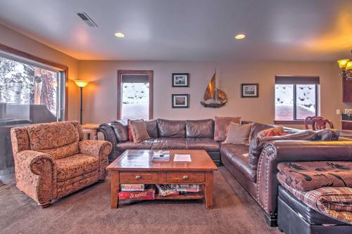 a living room with a couch and a table at Cozy Incline Village Townhome 2 Mi to Ski Beach in Incline Village