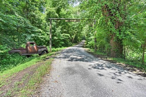 an old truck parked on the side of a road at Kentucky Cabin with 2 Fishing Ponds and Trail Access in New Concord