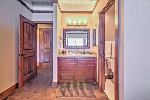 a bathroom with a sink and a mirror at Private Deck and Community Pool Incline Village Gem in Incline Village