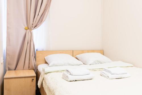 Кровать или кровати в номере Баунти Отель