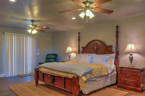 a bedroom with a bed and a ceiling fan at Central Escalante Home about 5 Mi to Grand Staircase! in Escalante