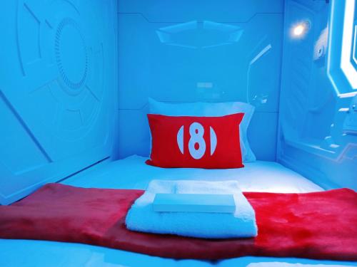 Una cama o camas en una habitación de 8Hostel