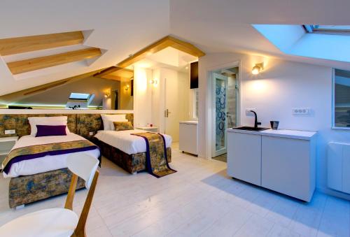 Postel nebo postele na pokoji v ubytování Diamond Rain Boutique Hotel