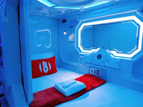 Una cama o camas en una habitación de 8Hostel