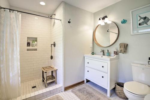 a bathroom with a shower and a toilet and a sink at Private Rockaway Beach Retreat 2 Blocks to Ocean! in Rockaway Beach