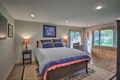 a bedroom with a large bed and a window at Private Rockaway Beach Retreat 2 Blocks to Ocean! in Rockaway Beach