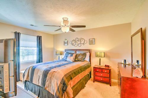 a bedroom with a bed and a ceiling fan at Myrtle Beach Oasis on River Oaks Golf Course! in Myrtle Beach