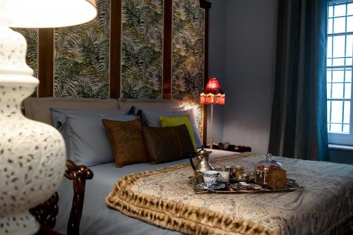 Postel nebo postele na pokoji v ubytování Villa Di Malpasso