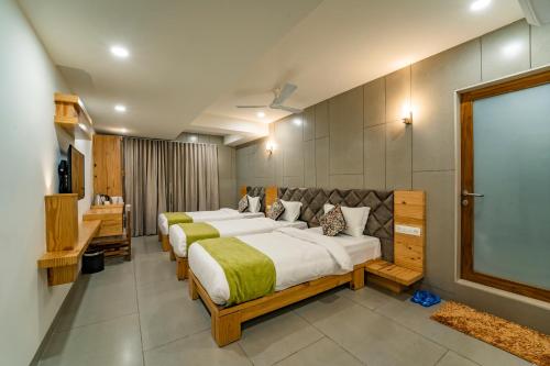 Ένα ή περισσότερα κρεβάτια σε δωμάτιο στο Hotel Pleasant Lake
