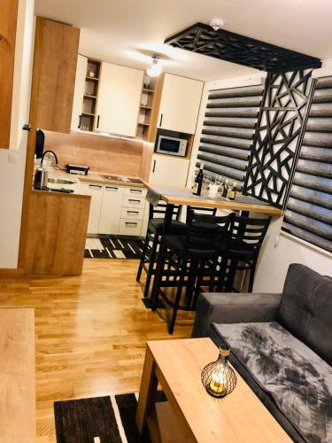 Кухня або міні-кухня у AM Apartment