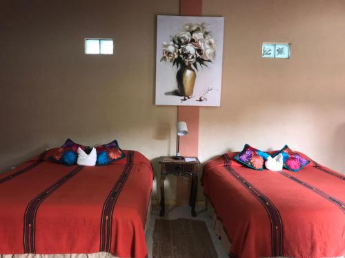 Katil atau katil-katil dalam bilik di Hotel Utz Jay