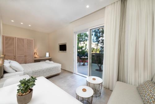 Ένα ή περισσότερα κρεβάτια σε δωμάτιο στο Stegna Dream