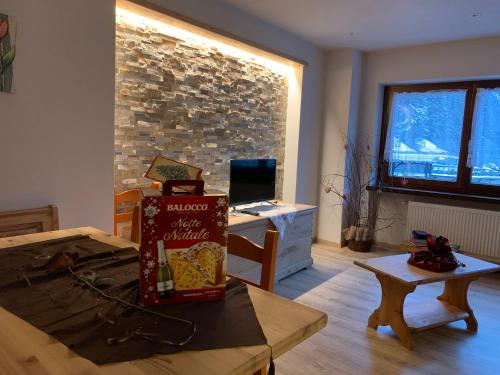 TV a/nebo společenská místnost v ubytování Appartamento Nani