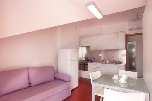 Kuchyň nebo kuchyňský kout v ubytování Hotel Residenza Giardino
