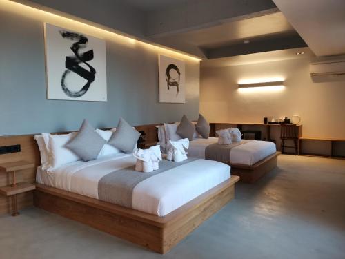 - une chambre avec 2 lits dans l'établissement M5 Hotel, à Chiang Mai