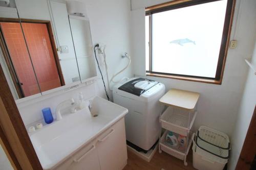 Ein Badezimmer in der Unterkunft Beach side hotel YAMORIYANONIKAI J29