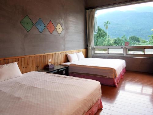 Säng eller sängar i ett rum på Ying Tian Ye Homestay