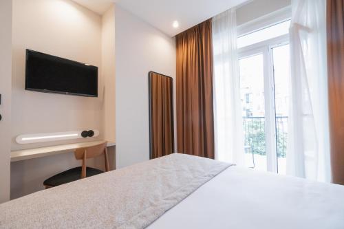 
Uma cama ou camas num quarto em LX SoHo Boutique Hotel by RIDAN Hotels
