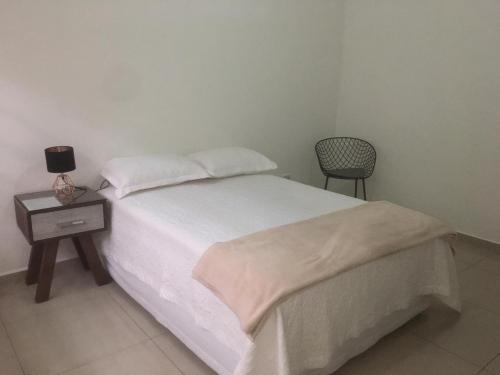 Ein Bett oder Betten in einem Zimmer der Unterkunft Sibaris