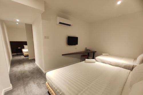 En eller flere senger på et rom på T Hotel Tandop