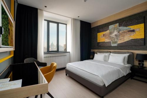 Postel nebo postele na pokoji v ubytování Maccani Black Luxury Suites