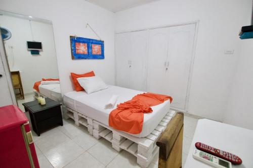 Postel nebo postele na pokoji v ubytování QuillaHost Guesthouse