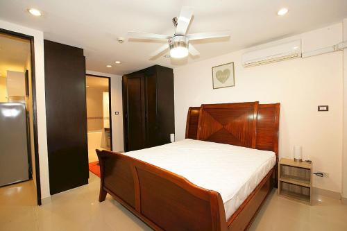 Postel nebo postele na pokoji v ubytování Wongamat Privacy Naklua Soi 16-2