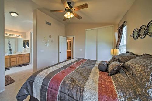A bed or beds in a room at Goodyear Home with Pool, 2 Mi to Goodyear Ballpark