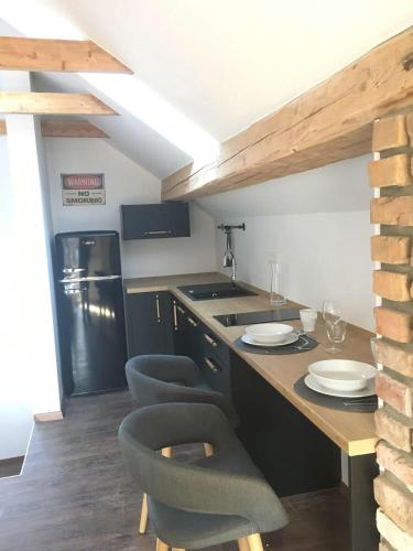 Kuchyň nebo kuchyňský kout v ubytování Kasita Bled Apartments