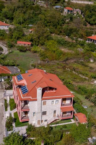an aerial view of a house with an orange roof at Xenonas Kypseli in Kipseli