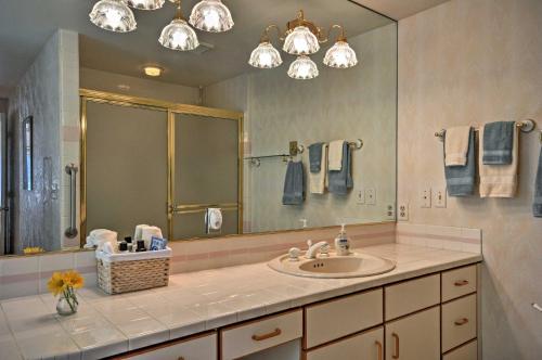 a bathroom with a sink and a large mirror at Anns Aerie Home with Gorgeous Views and Special Rates! in Stevenson