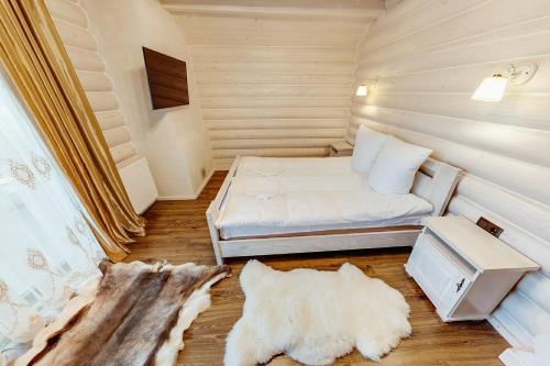 Ένα ή περισσότερα κρεβάτια σε δωμάτιο στο Cottage Diamant Y&M