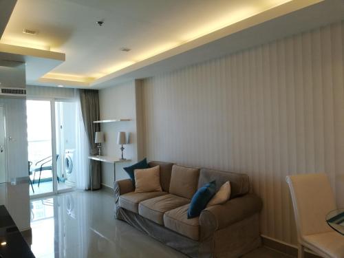 Ruang duduk di Cosy Beach View Apartments