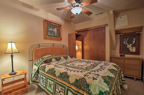 a bedroom with a bed and a ceiling fan at Big Family Fun! Mtn Cabin Between Bryce and Zion in Long Valley Junction