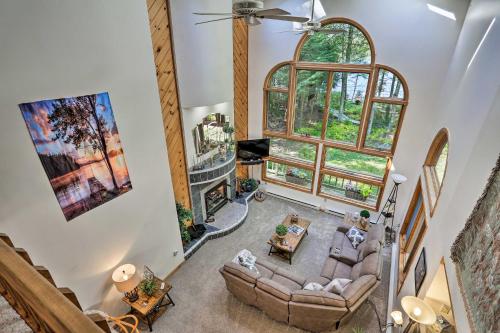 an overhead view of a living room with a large window at Pocono Lake Paradise with Private Beach and Dock! in Pocono Lake