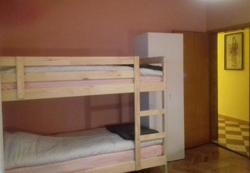 a couple of bunk beds in a room at Apartma Kolpa in Gradac