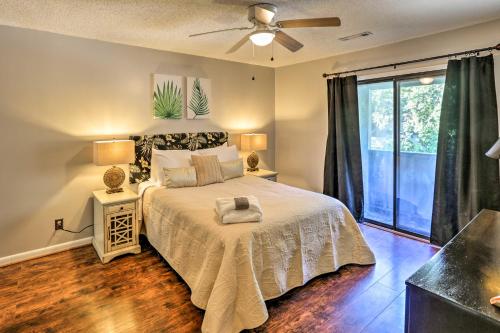 A bed or beds in a room at Mount Pleasant Condo - Near Charleston and Beaches!