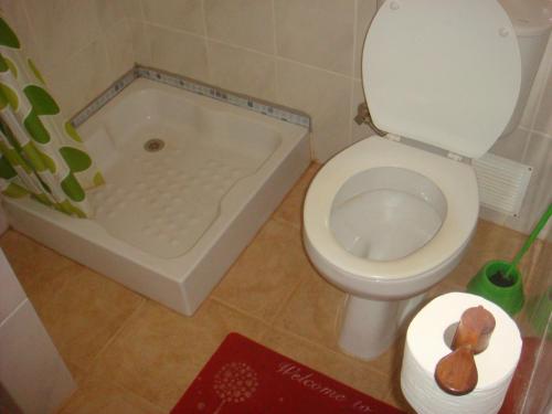 Koupelna v ubytování Akwaba chambre double et salle de bain privative