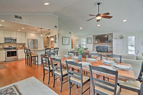 A restaurant or other place to eat at Waterfront Midway Home with Private Dock and Grill!