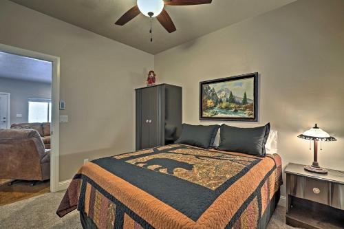 a bedroom with a bed and a ceiling fan at Mammoth Creek Apt Between Bryce Canyon and Zion! in Hatch