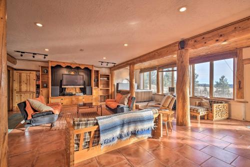 a living room with couches and chairs and a television at Eagle Nest Home with Hot Tub and Views - 5 Min to Lake in Eagle Nest