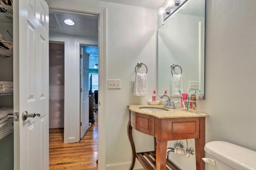 a bathroom with a sink and a mirror at Carrabelle Home Near River, Beach and Downtown! in Carrabelle