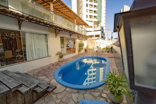 Swimming pool sa o malapit sa Casa de Maria Suítes