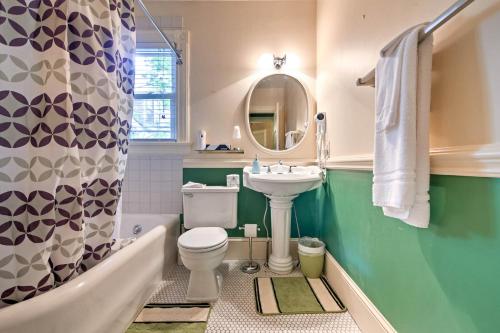 a bathroom with a sink and a toilet and a tub at Central Bar Harbor Home, Walk to the Shore and Town! in Bar Harbor