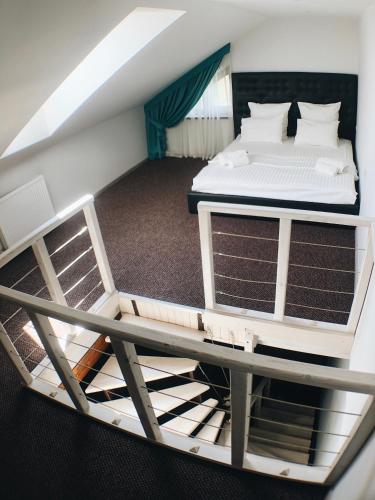 a bedroom with two bunk beds in a attic at ART Boutique Chalet in Yanoshi