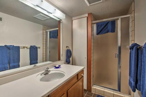 a bathroom with a sink and a shower at 11 Mi to Palisades Tahoe Lakefront Home with View! in Tahoe City