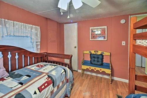 a bedroom with red walls and a bed and a window at Salter Path Home-Short Walk to Indian Shores and Bay in Salter Path