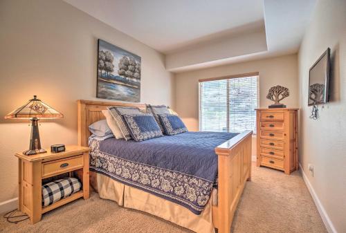a bedroom with a bed and a dresser and a window at Mammoth Lakes Townhome - 10-Min Walk to Village! in Mammoth Lakes